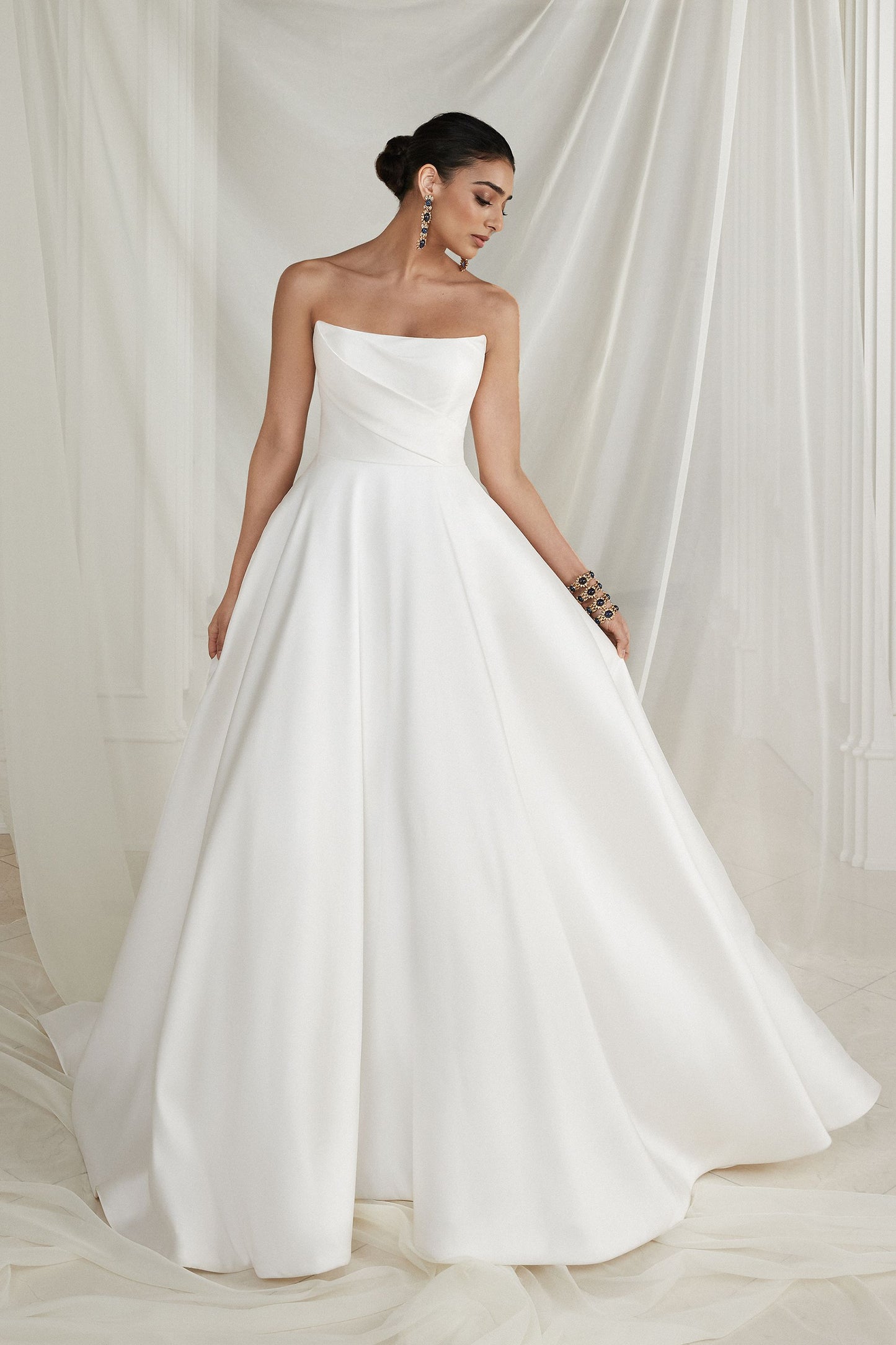 Justin Alexander Strapless Mikado A-Line Wedding Dress with Pleated Bodice and Bow
STYLE Estelle