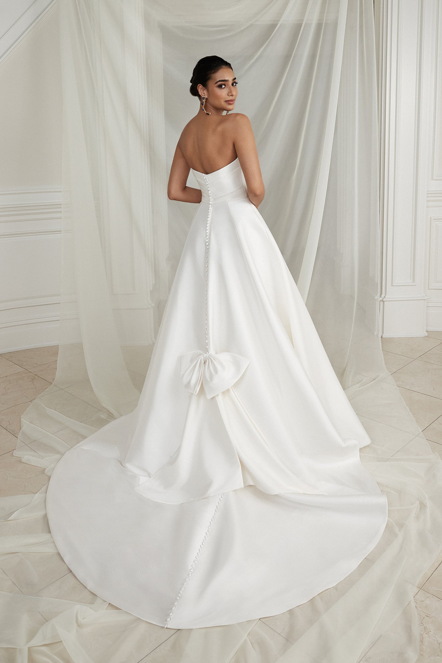 Justin Alexander Strapless Mikado A-Line Wedding Dress with Pleated Bodice and Bow
STYLE Estelle