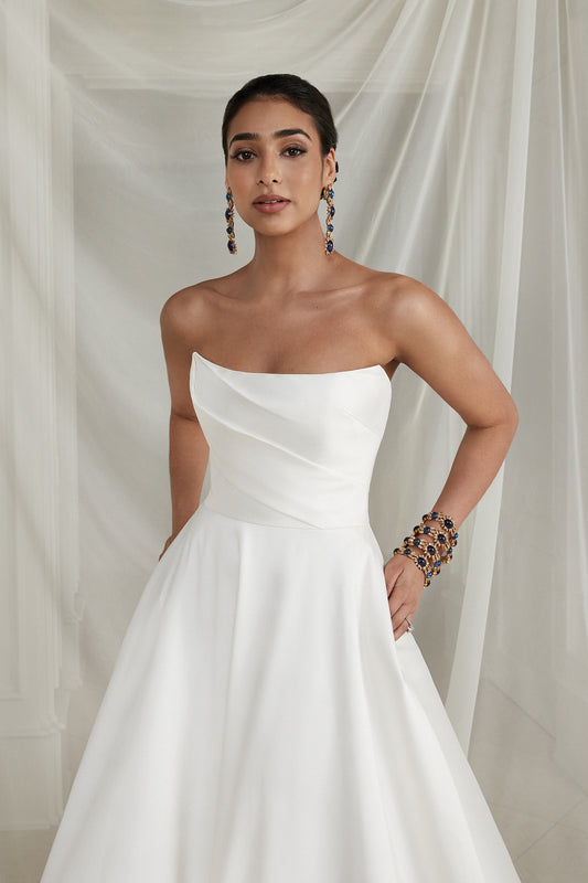 Justin Alexander Strapless Mikado A-Line Wedding Dress with Pleated Bodice and Bow
STYLE Estelle