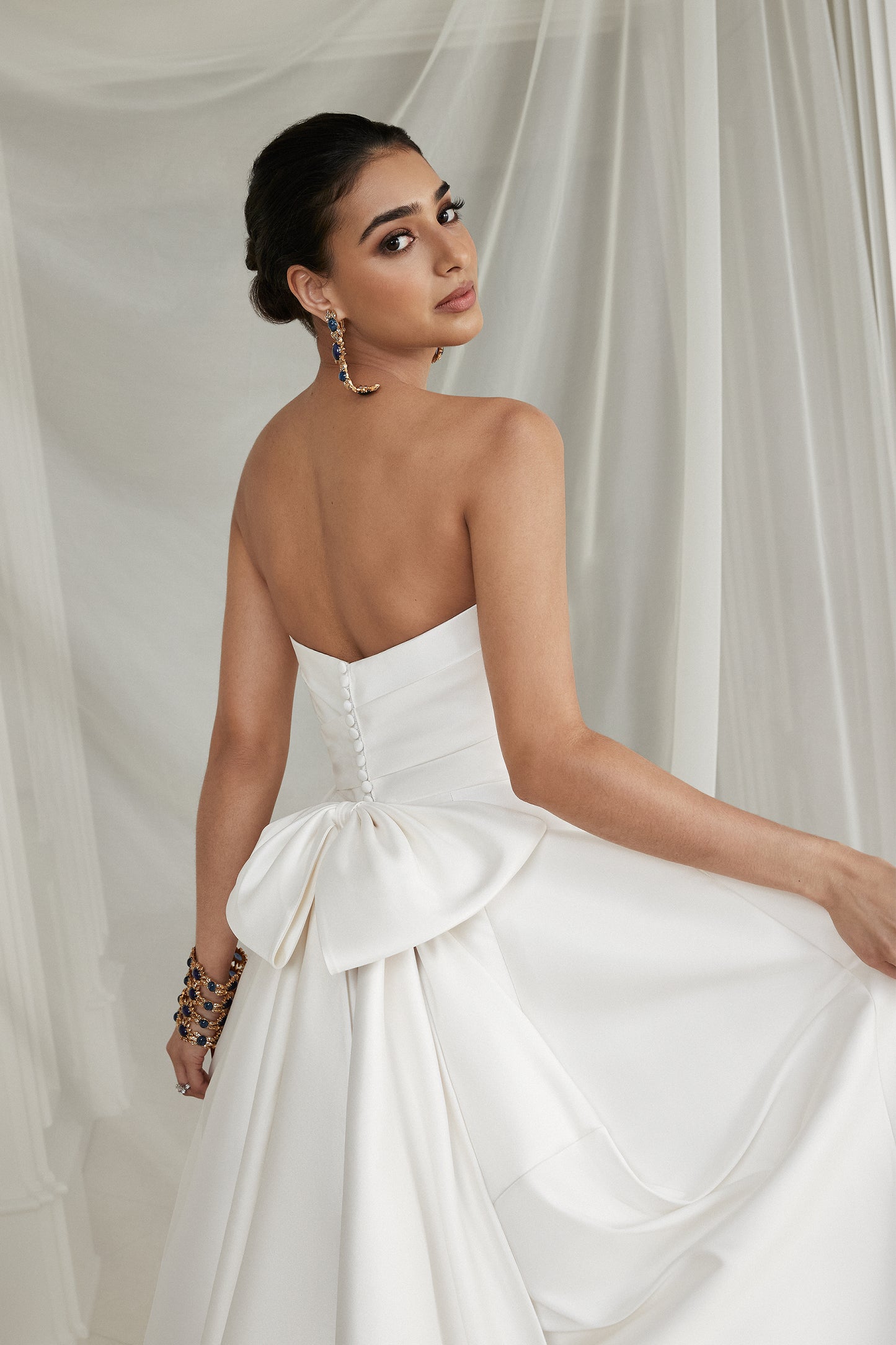 Justin Alexander Strapless Mikado A-Line Wedding Dress with Pleated Bodice and Bow
STYLE Estelle