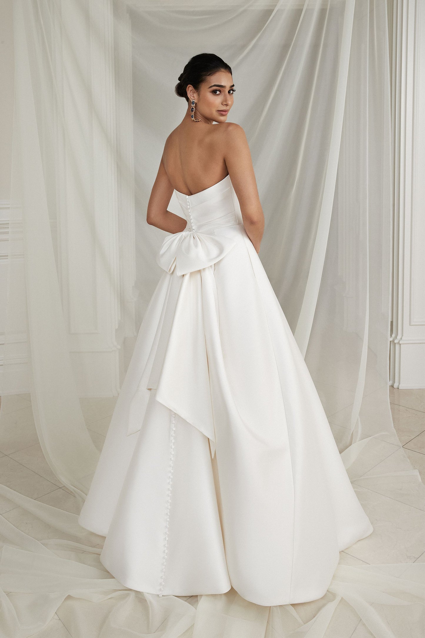 Justin Alexander Strapless Mikado A-Line Wedding Dress with Pleated Bodice and Bow
STYLE Estelle